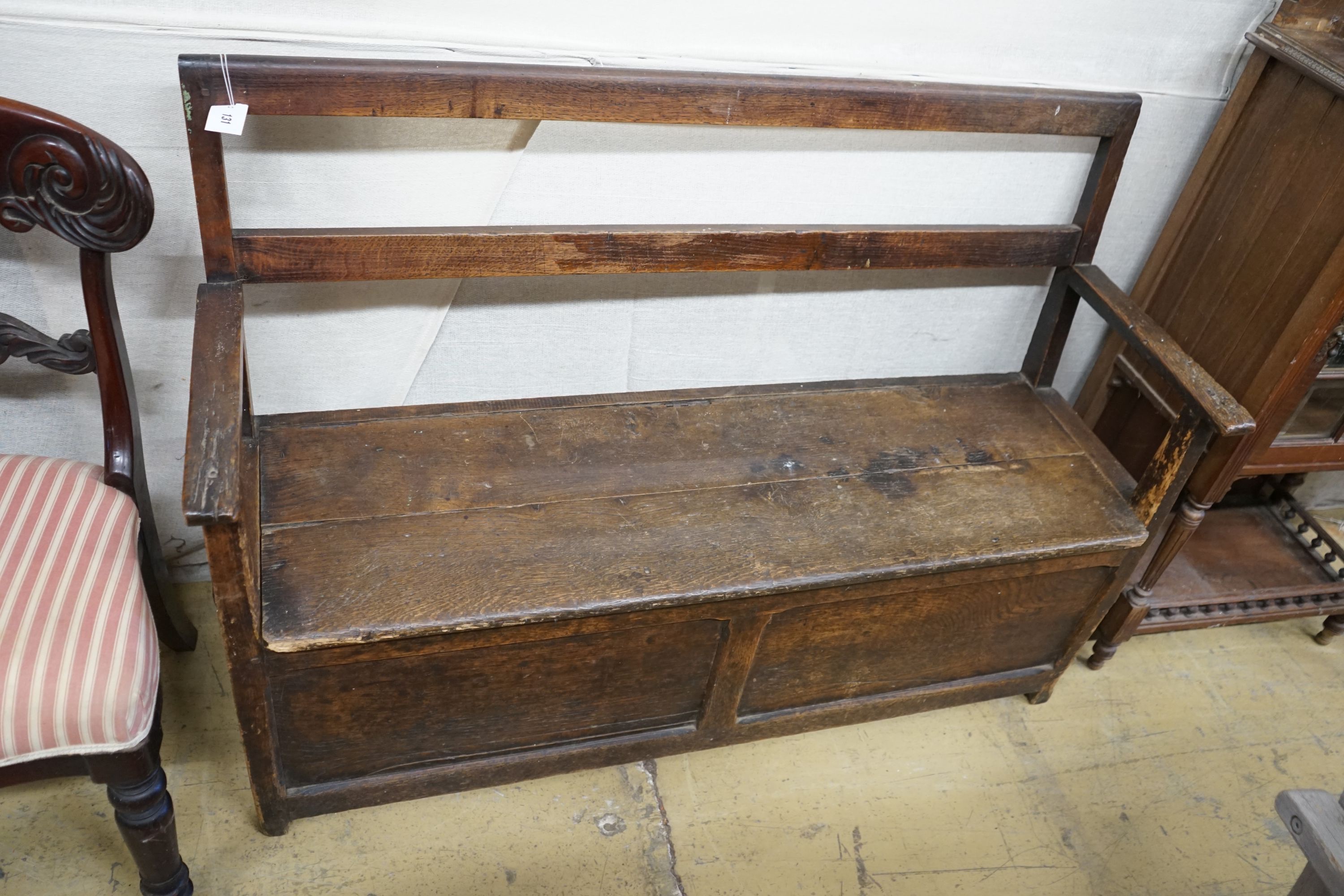 A small 19th century oak box seat settle, length 127cm, depth 38cm, height 91cm